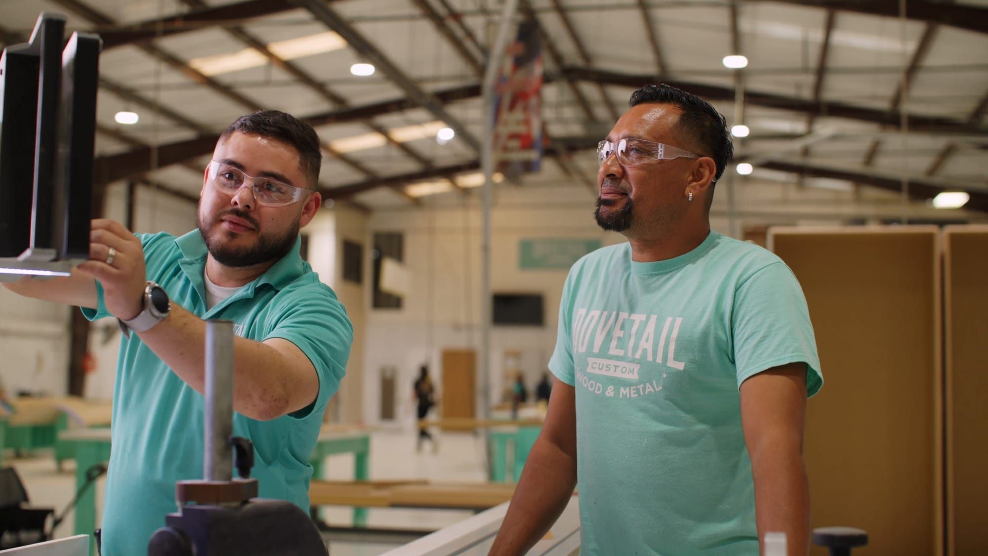 Dovetail craftspeople at work in the Del Valle shop