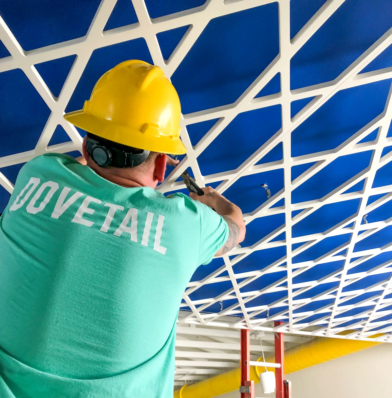 Dovetail installation crew in high-visibility vests on site