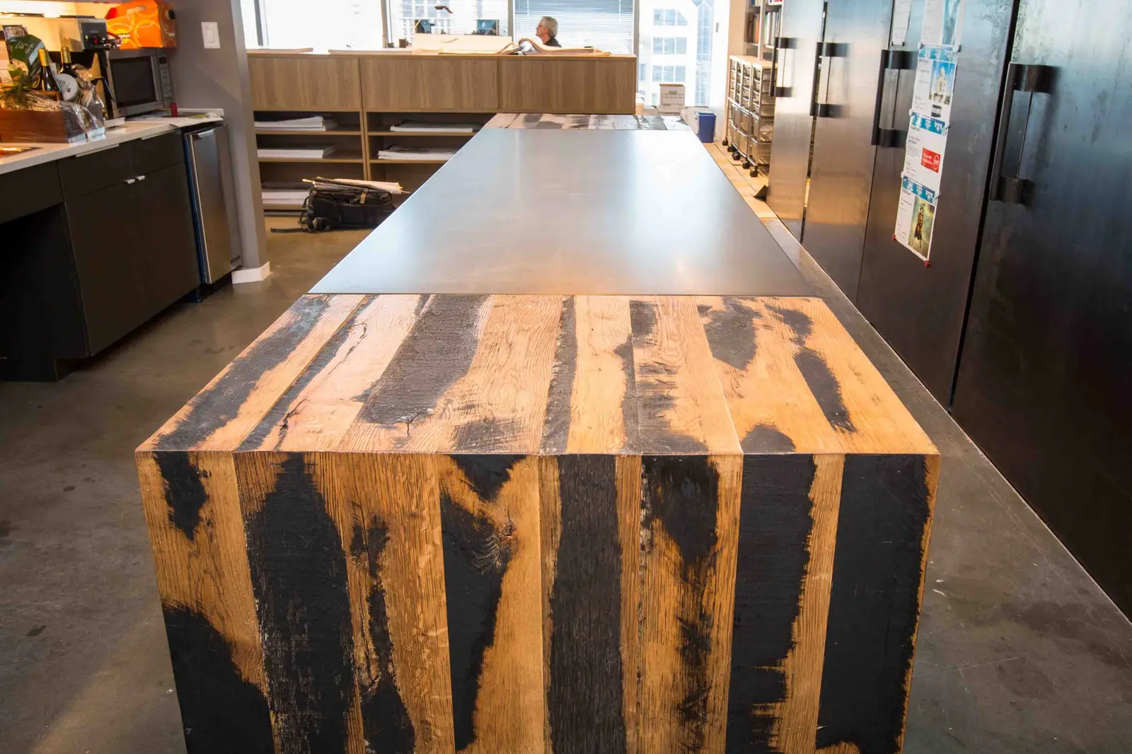 Boka Powell long counter with a block-patterned burned wood end
