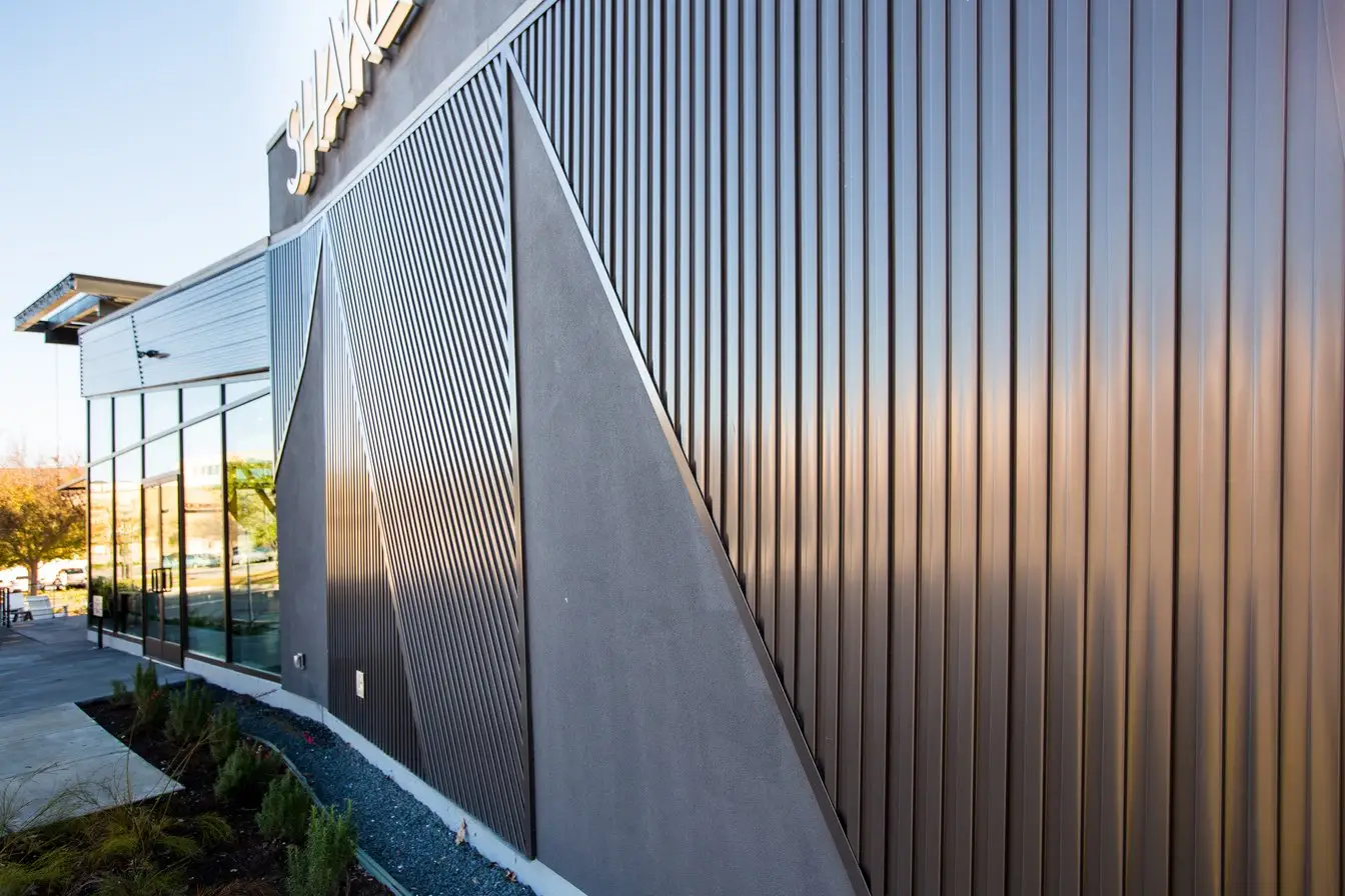 Shake Shack Domain angled dark metal wall panels along the building exterior