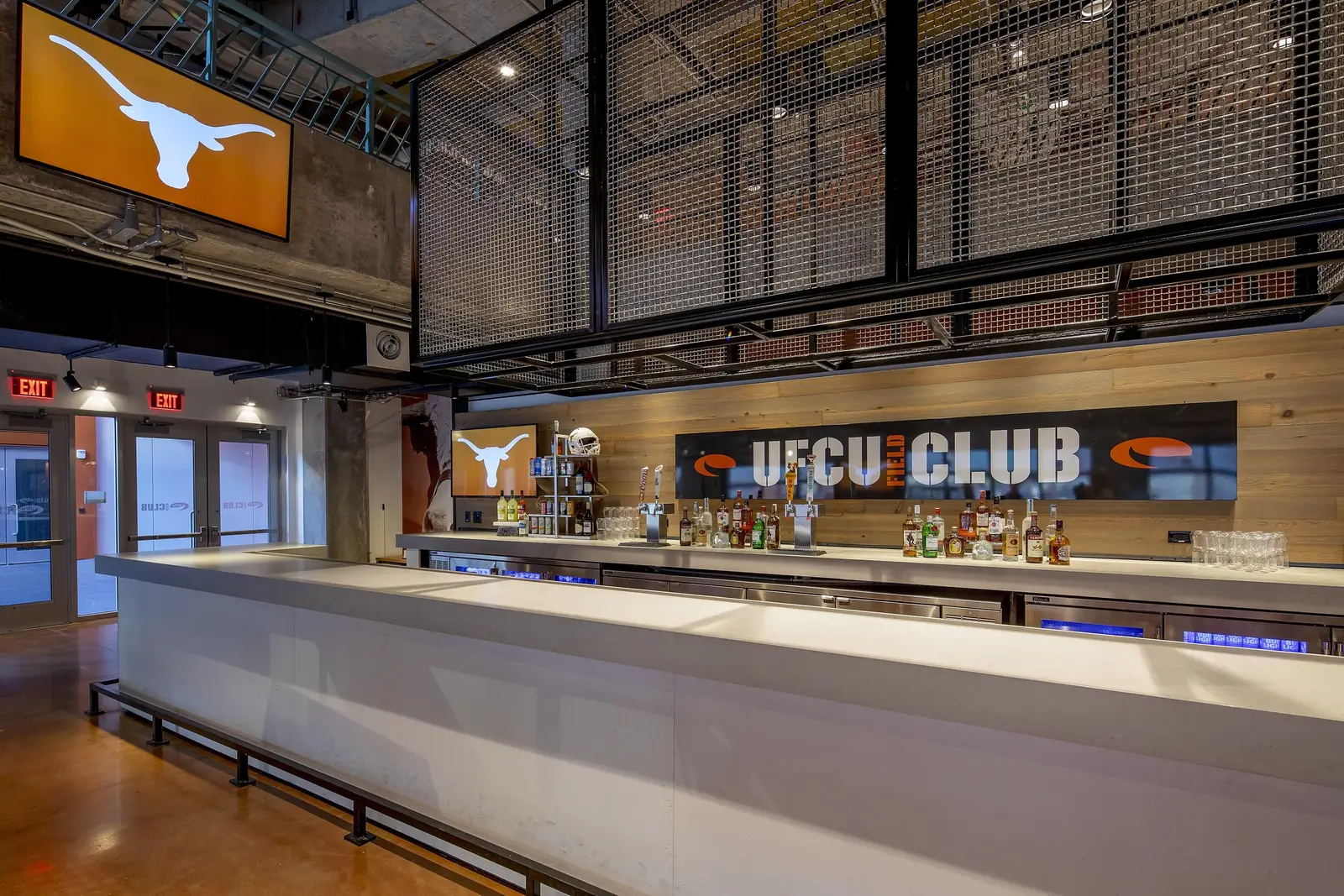 University of Texas South End Zone club bar counter with a white top and Longhorn logo